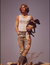 44. Hitchhiker with His Dog "Tripper" on U.S. 66, May 1972. Photographer: Charles O'Rear