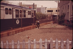 13. MBTA (Metropolitan Boston Transit Authority) Train Roars Past Northeastern Side of Neptune Road 05/1973. Photographer: Michael Philip Manheim
