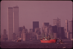 01. World Trade Center (Left) and Lower Hudson River Shipping Seen From the Staten Island Ferry 05/1973. Photographer: Wil Blanche