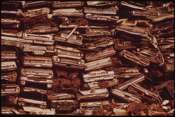 23. Stacked Cars In City Junkyard Will Be Used For Scrap, August 1973. Photographer: Dick Swanson
